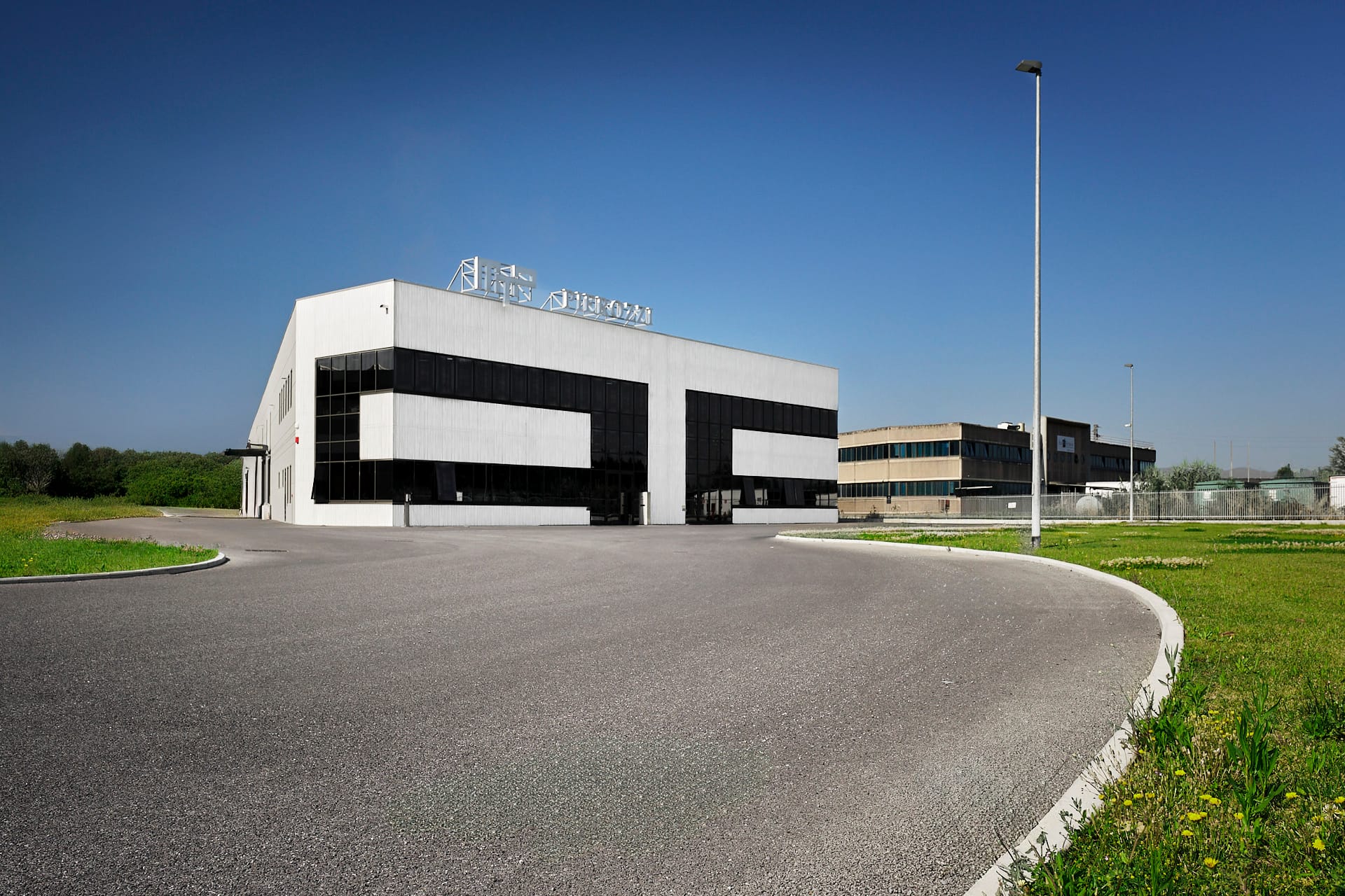 Fotografia di architettura industriale: i capannoni Truzzi a Prato 1 Capannoni industriali Truzzi a Prato, foto Amius Studio